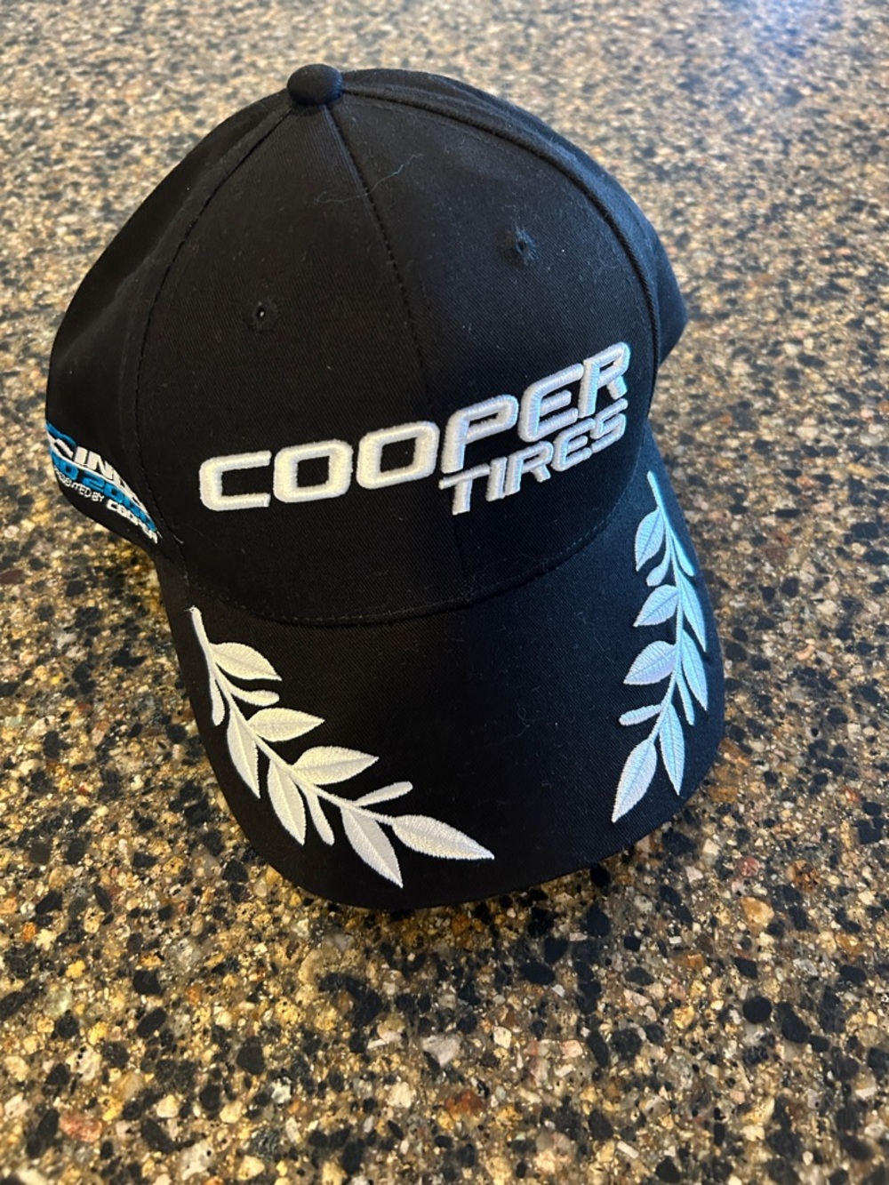 NEW Cooper Tires Black Embroidered Cap With White Leaf Accents